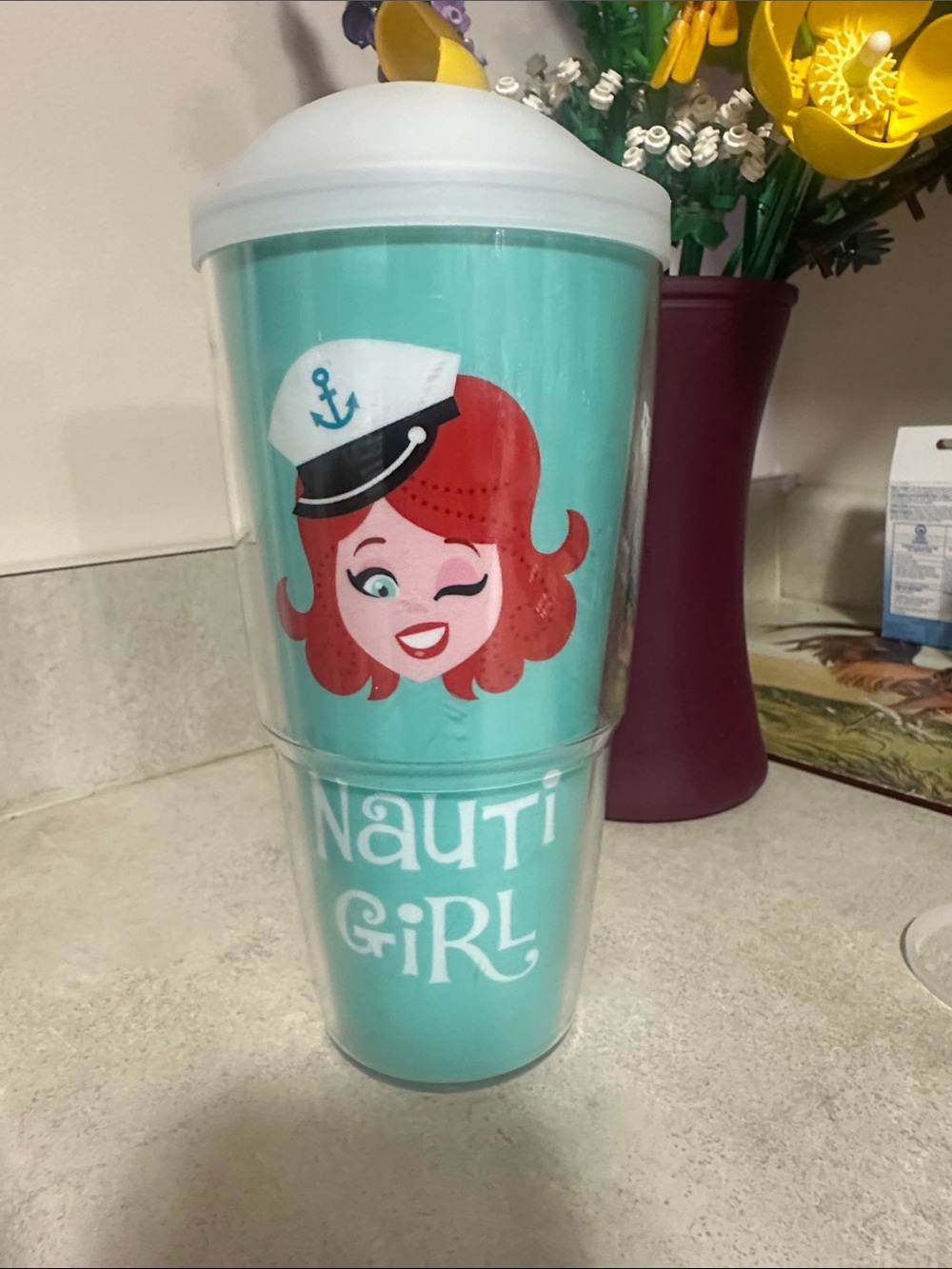 NAUTI GIRL.  LIKE NEW TERVIS TUMBLER WITH LID